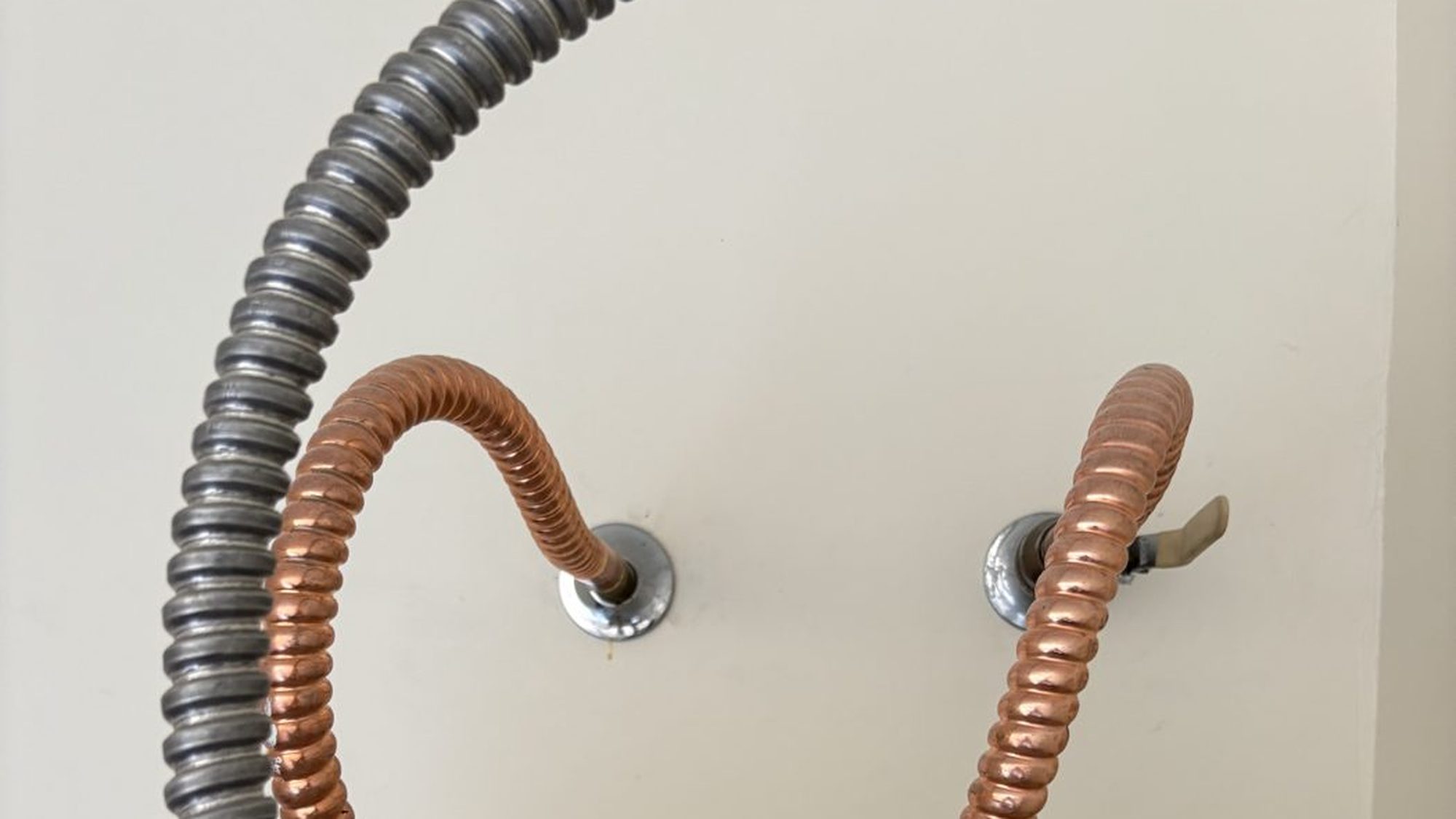 Copper-flex hot and cold connections on top of a new tank water heater